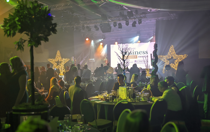 Lincolnshire Buisness Awards held at the Engine Shed, Lincoln in may 2022. The venue is filled with people and fizzcos decorations.