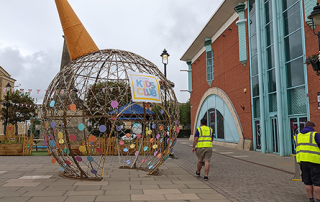 giant ice cream frame with pastel coloured disks displayed at st. marks shopping centre, lincoln.